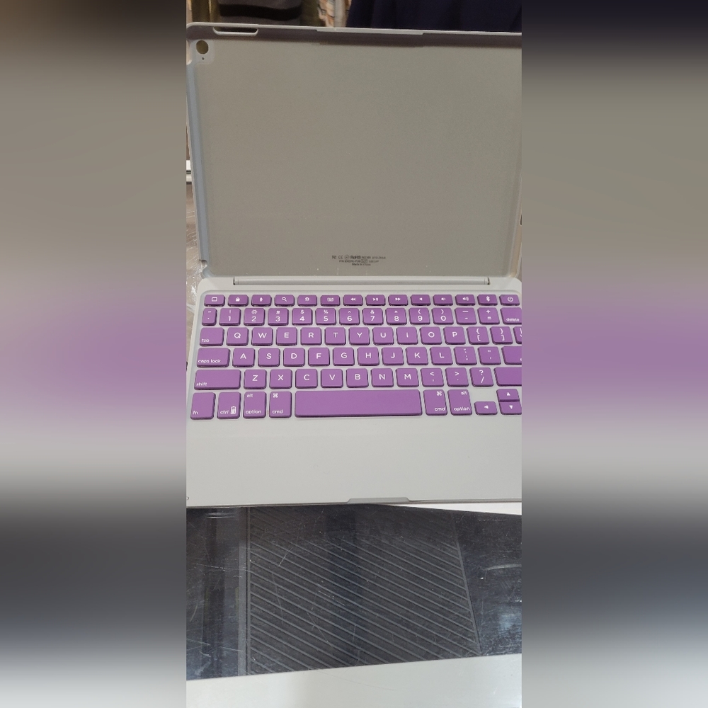 Zagg Folio case hinged keyboard for iPad air 2 purple